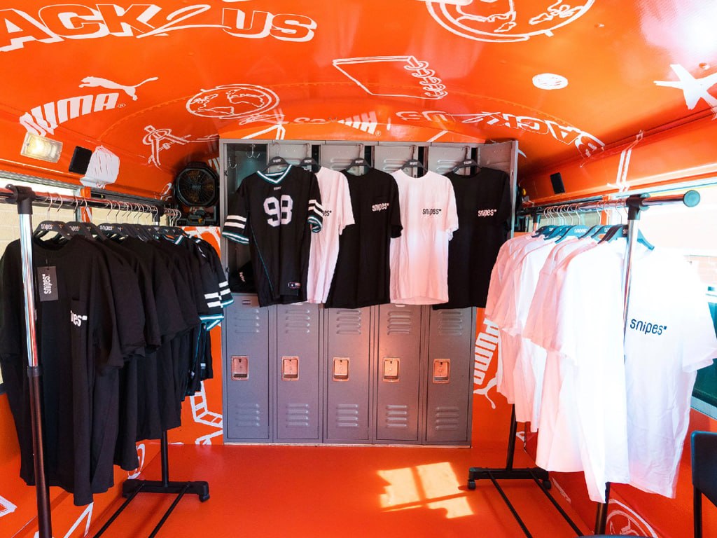 Snipes x Puma mobile retail buildout interior with merchandise